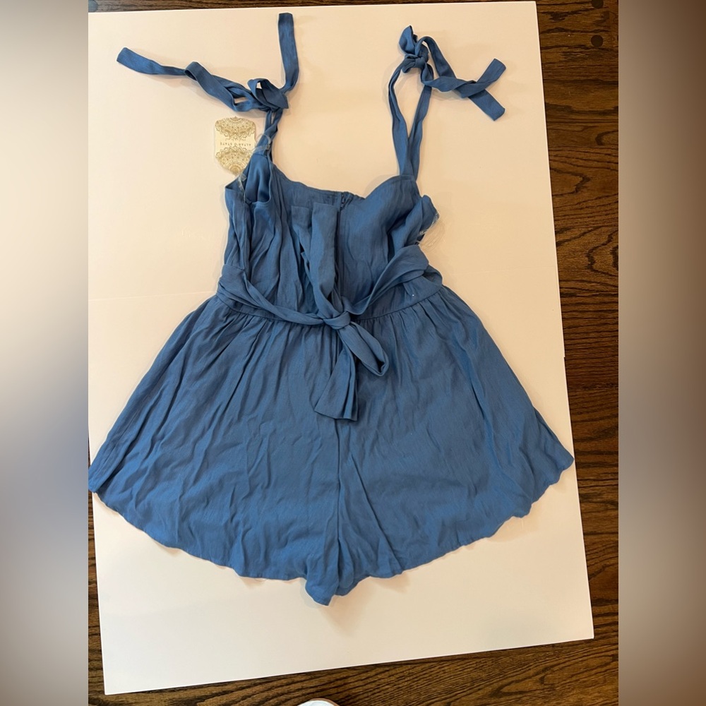 Altar’d State romper in blue. Size L. New with tags.